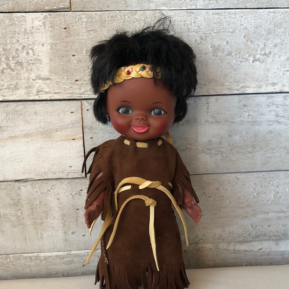 Adorable Indigenous doll with fringe dress and beaded moose hide headband